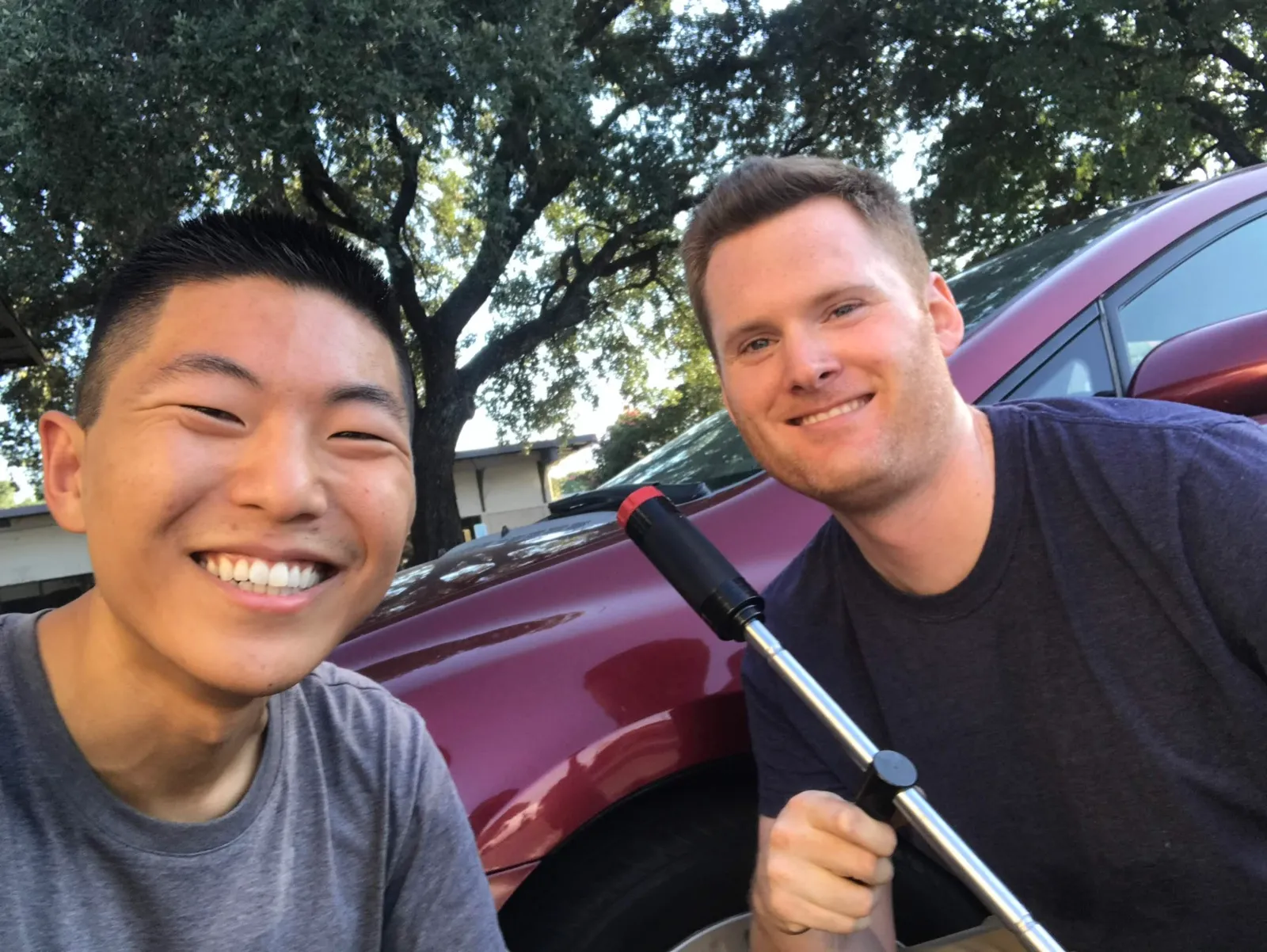 In this photo: Scott teaches me the basic life skill of changing my tires.