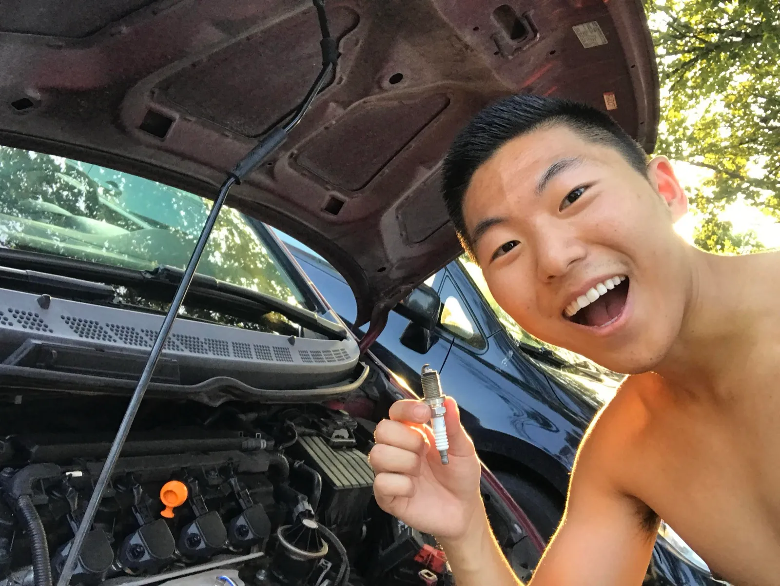 Me being super proud of myself after changing my spark plugs without having anything explode.